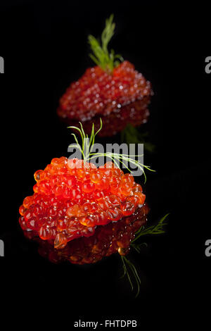 Caviar isolated on black. Stock Photo