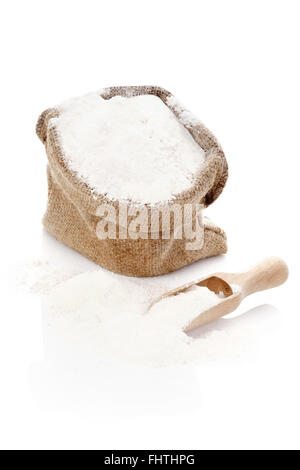 Burlap sack with flour. Stock Photo