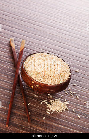 Luxurious minimal natural brown rice background. Raw rice crop in brown ...