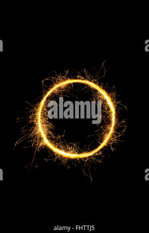 Sparkling circle isolated on black. Stock Photo