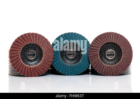 Flap abrasive disks isolated on white. Good for grinding, metal finishing, sanding. Professional equipment Stock Photo