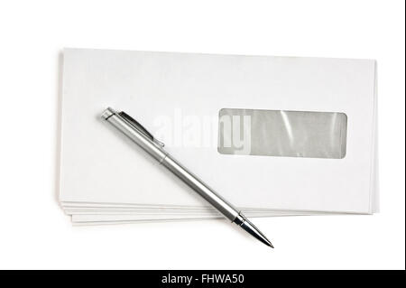stack of mail envelopes and a pen Stock Photo