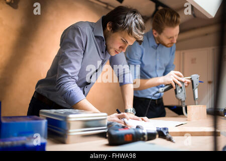 Industrial planning in workshop by creative people Stock Photo