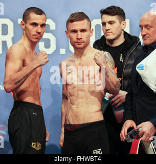 Manchester Arena, Manchester,UK 26th Feb 2016.  Scott Quigg v Carl Frampton Weigh in ahead of the IBF and WBA Super Bantamweight World Title Fight on Saturday 27th Feb at the Manchester Arena live on Sky Sports Boxing Picture of Carl Frampton (R) and Scott Quigg (L) at the weighing.  Credit:  Stephen Gaunt/Alamy Live News Stock Photo