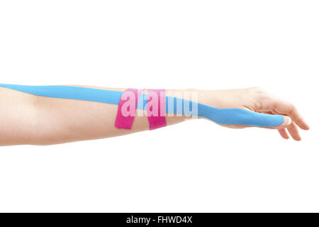 Kinesio tape on female hand. Stock Photo