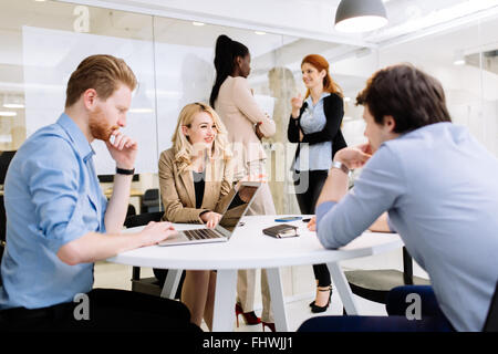 Group of business people working in office and discussing new ideas Stock Photo