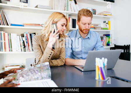 Businesspeople working in modern office and collaborating Stock Photo