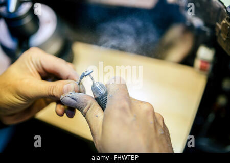 Inhaling dust particles flying around during work may be dangerous Stock Photo