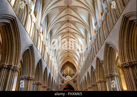 Wells Cathedral Nave. Vaulted ceiling / St Andrews Cross arches / Scissor arch and Jesus Christ crucified on the cross. Somerset, England. Stock Photo