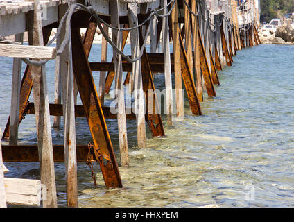 Rusty Wooden Footbridge or Walkway over the Mediterranean Stock Photo