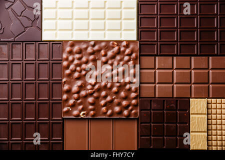 Chocolate bar assortment pattern background wallpaper Stock Photo