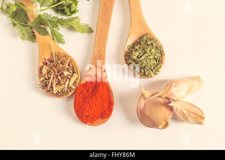 Various kinds of spices isolated on light background. Shallow depth of field Stock Photo