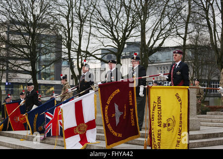 Rochdale, UK. 26th February, 2016. Standard bearers lower the flags at the cenotaph in Rochdale, UK 26th February 2016 Credit:  Barbara Cook/Alamy Live News Stock Photo