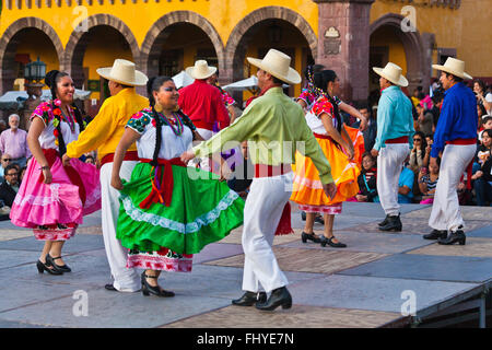 DANCERS perform in the Jardin or Central Square during the annual FOLK DANCE FESTIVAL - SAN MIGUEL DE ALLENDE, MEXICO Stock Photo
