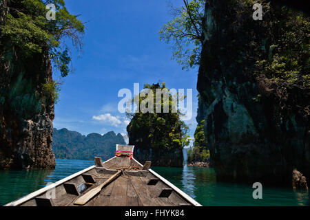 KARST FORMATIONS covered with tropical jungle at CHEOW EN LAKE in the KHAO SOK NATIONAL PARK - THAILAND Stock Photo