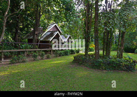 The RIVERSIDE COTTAGES in KHO SOK are a perfect place to stay to visit Kho Sok National Park - THAILAND Stock Photo