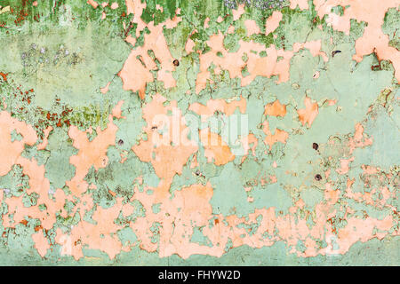 background from peeling paint on wall of old house Stock Photo