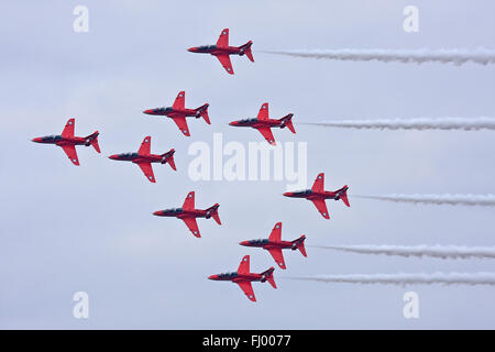RAF Aerobatic Team The Red Arrows performing over RAF Coningsby. Stock Photo
