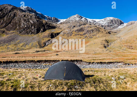 winter wild camp on Great Moss in the Upper Esk valley, Lake District, Cumbria, UK, below the Scafell massif Stock Photo
