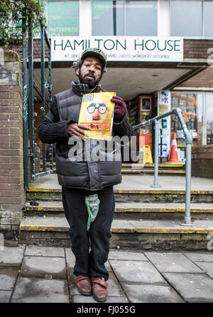 Big Issue Seller in Stokes Croft Bristol Stock Photo