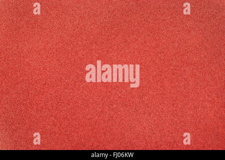 Red metal background with frosted sand texture Stock Photo