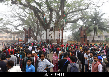 People wait for immigration check border crossings on the no man's land of Indo-Bangla border in Benapole at Jessore, Bangladesh Stock Photo