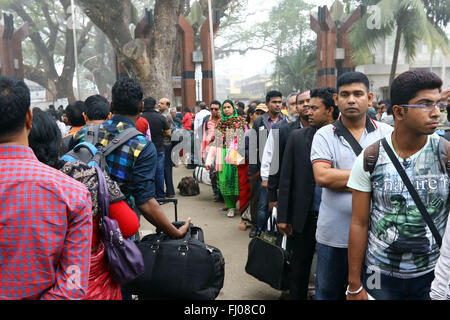 People wait for immigration check border crossings on the no man's land of Indo-Bangla border in Benapole at Jessore, Bangladesh Stock Photo