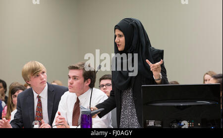 Muslim teen girl in hijab posing as prosecuting attorney presents case ...