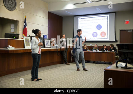 Counselors discuss relationship violence with high schoolers at mock trial for murder defendant accused of assaulting girlfriend Stock Photo