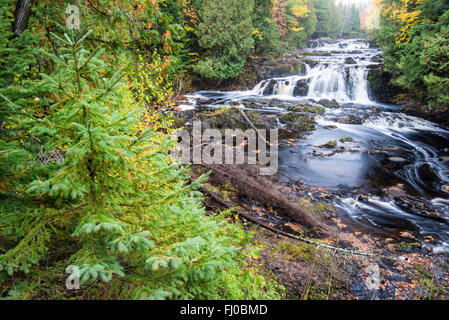 The Tyler Fork of the Bad River flows over the Cascades waterfall in Copper Falls State Park, Ashland County, Wisconsin, USA. Stock Photo