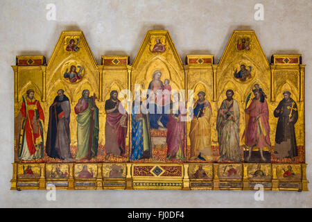 Florence, Tuscany, Italy.  Santa Croce Basilica.  Madonna and Child Enthroned between Saints Louis of Toulouse and John the Evan Stock Photo