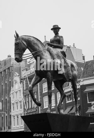 The equestrian statue on Queen Wilhelmina on Rokin in central Amsterdam Stock Photo