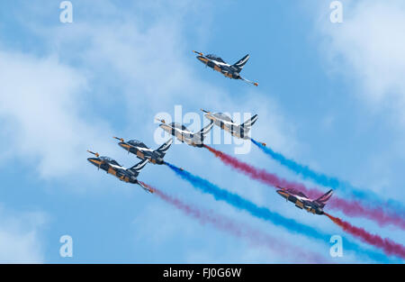 Aircraft from the Republic of Korea's Black Eagles aerobatic display team fly in close proximity at the 2016 Singapore Airshow. Stock Photo
