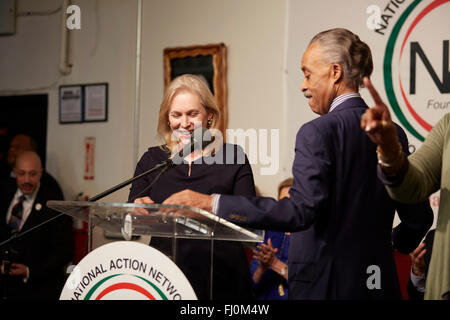 NY Senator Kristen Gillibrand (l) speaks Martin Luther King Jr, NAN House of Justice Harlem NY, intro Rev Sharpton (r) Stock Photo