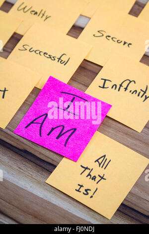 very powerful self help concept using positive messages and a I am floating above all the positive thoughts Stock Photo