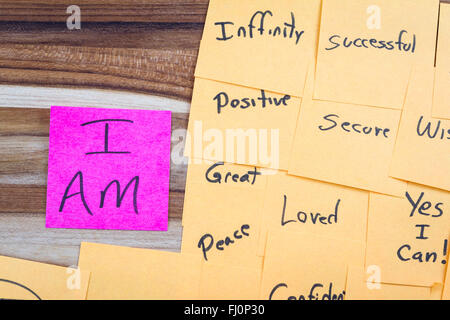 very powerful self help concept using positive messages and a I am floating above all the positive thoughts Stock Photo