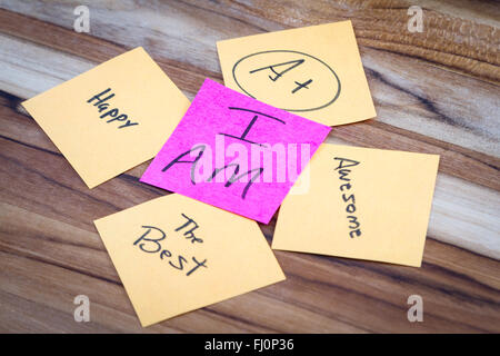 very powerful self help concept using positive messages and a I am floating above all the positive thoughts Stock Photo