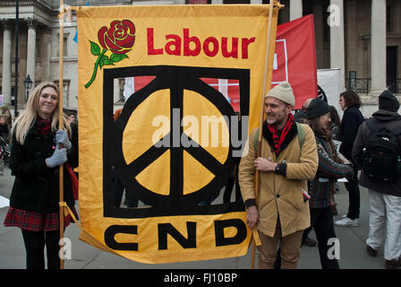 Large banner linking 'Labour' and 'CND' with the CND symbol being carried at anti Trident demostration. Stock Photo