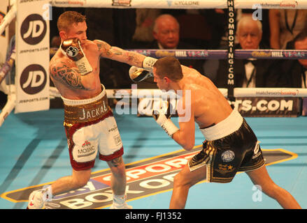 Manchester Arena, Manchester,UK 27th Feb 2016.  Carl Frampton vs Scott Quigg  IBF and WBA World Super Bantam Weight Championship Carl Frampton (Red/White/Gold) v Scott Quigg (Black/White/Gold)  Credit: Stephen Gaunt/Touchlinepics.com/Alamy Live News Stock Photo