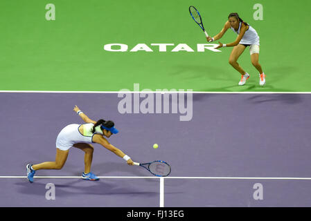Doha. 27th Feb, 2016. Hao-Ching Chan (R) of Chinese Taipei and Yung-Jan Chan Chinese Taipei compete during the final match of women's doubles against Sara Errani of Italy and Carla Suarez Navarro of Spain at the WTA Qatar Total Open 2016 at the International Khalifa Tennis Complex Doha, Qatar February 27, 2016. Hao-Ching Chan and Yung-Jan Chan won 2-0 and claimed the title. Credit:  Nikku/Xinhua/Alamy Live News Stock Photo