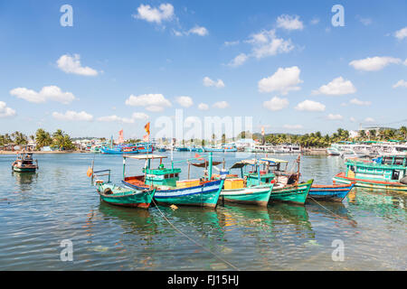 Traditional fishermen boats lined in the  harbor of Duong Dong town in the popular Phu Quoc island in south Vietnam Stock Photo