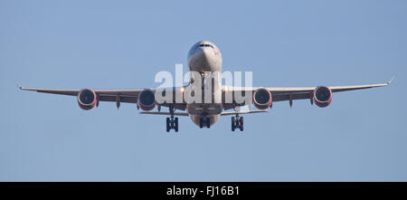 Virgin Atlantic Airbus a340 G-VBUG on final approach to London-Heathrow Airport LHR Stock Photo