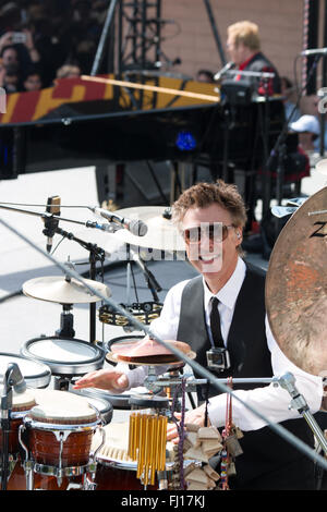 Los Angeles, California, USA. 27th February, 2016.  John Mahon, percussionist, plays drums at the Elton John free concert on Sunset Strip held in honor of the City of West Hollywood. Credit:  Sheri Determan/Alamy Live News Stock Photo