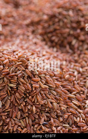 Portion of red Rice as detailed close-up shot for use as background image or as texture Stock Photo