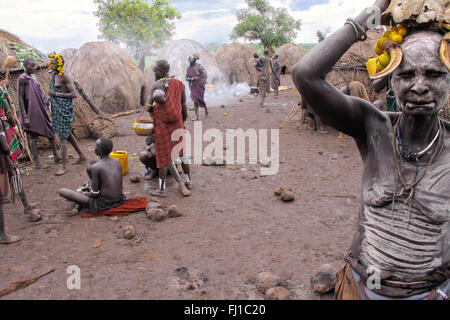 Stunning portrait of Mursi woman in typical traditional Mursi village, Mago National Park , Ethiopia Stock Photo