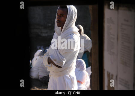 Single Ethiopian man during orthodox ceremony at Nakuta La'ab Monastery , near lalibela , Ethiopia Stock Photo