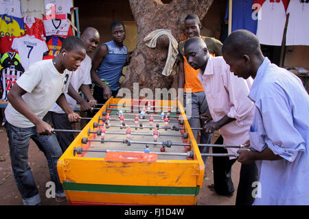Group of young men playing Baby foot in the market in Bobo Dioulasso , Burkina Faso Stock Photo