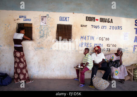 people waiting at bus stand in Dori , Burkina Faso Stock Photo