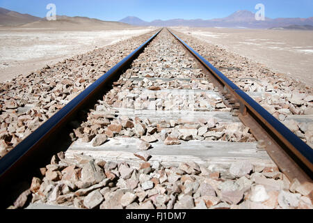 Train rails tracks in Salar de Uyuni Sud Lipez area , Bolivia Stock Photo