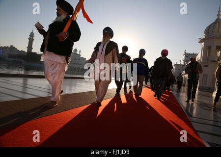 Procession of Sikh pilgrims at Golden temple , Amritsar , India Stock Photo